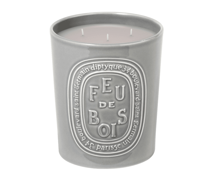 FEU DE BOIS scented candle in a light grey vessel