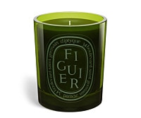 Figuier Scented Candle in a green colored blown-glass container.