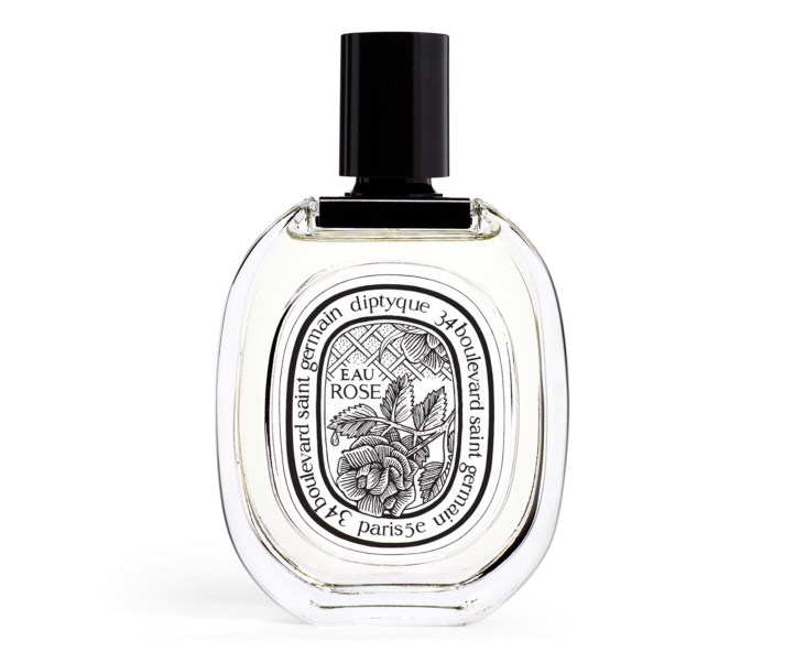 Eau Rose Eau de Toilette with a black and white rose displayed on the front of the spray bottle.