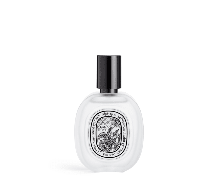Rose scented hair mist in tiny glass bottle by diptyque